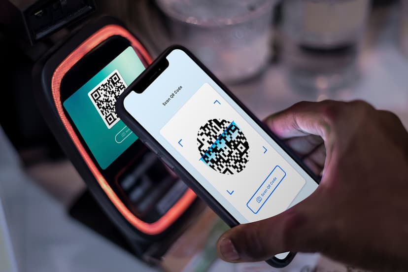 Mobile phone displaying QR code for digital wallet payments